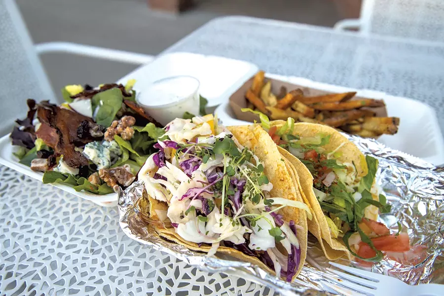 Waldorf salad, hand-cut French fries and tacos from the Drake Bar and Kitchen - JAMES BUCK