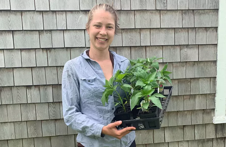Laura Slesar with seedlings from Red Wagon Plants - COURTESY PHOTO