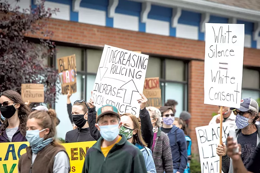 Protesters marching Saturday in Colchester - LUKE AWTRY