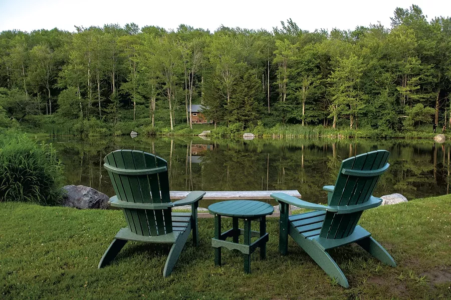 Adirondack chairs by the pond - CALEB KENNA ©️ SEVEN DAYS