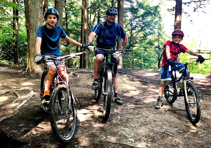 Bousquet and his boys mountain biking - BROOKE BOUSQUET