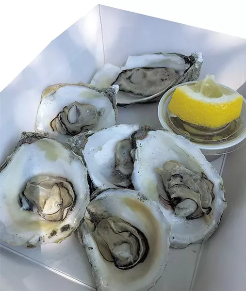 Grilled oysters at Dedalus - JORDAN BARRY ©️ SEVEN DAYS