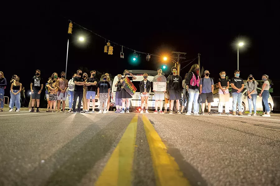 Protesters blocking traffic at Pearl and Battery streets - JAMES BUCK