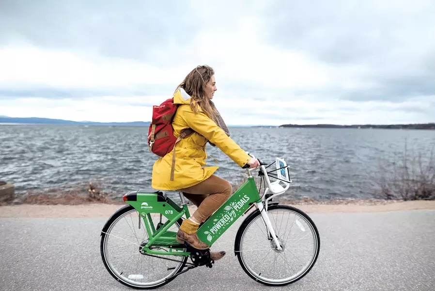 A cyclist on a Greenride bike in Burlington - COURTESY OF GOTCHA
