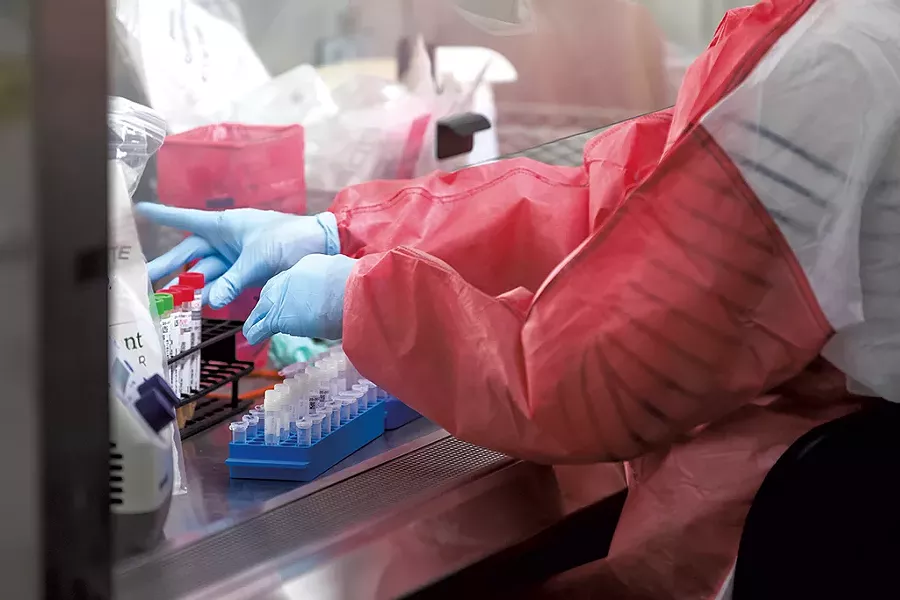 Running coronavirus tests at the Vermont Department of Health lab - FILE: OLIVER PARINI