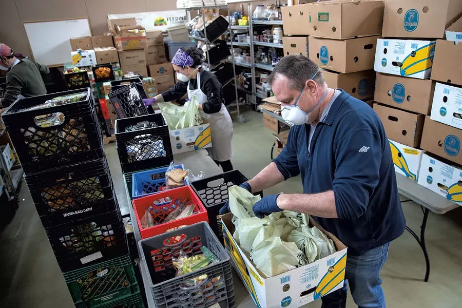 Packing food at Feeding Chittenden in April - FILE: JAMES BUCK
