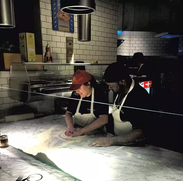 The author making pizza with Bruce Ringgold - COURTESY OF PIZZERIA VERITÀ