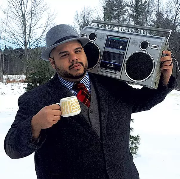 Roberto Lugo holding a Margaret Kinkeade cup - COURTESY OF ROBERTO LUGO