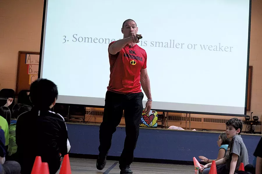 Tom Murphy speaking to fourth and fifth graders at Thomas Fleming School in Essex Junction - MATTHEW THORSEN