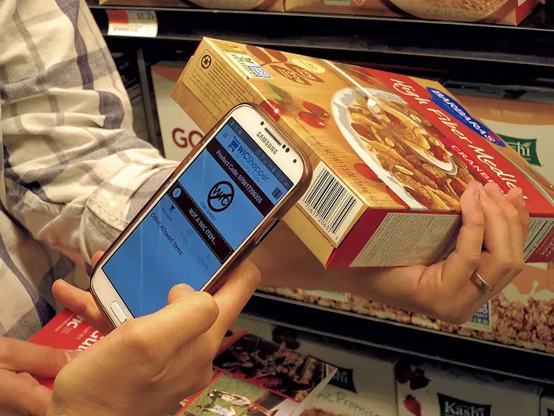 Scanning a cereal box with the WICShopper app - MATTHEW THORSEN