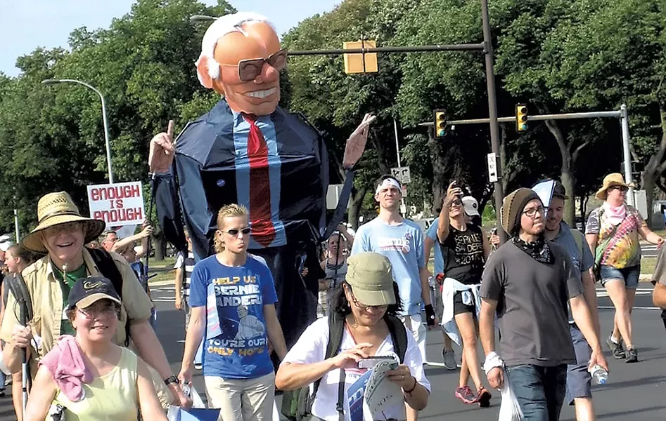 The man inside this 10-foot-tall Big Bernie creation: Los Angeles artist Alex Schaefer - KEVIN J. KELLEY
