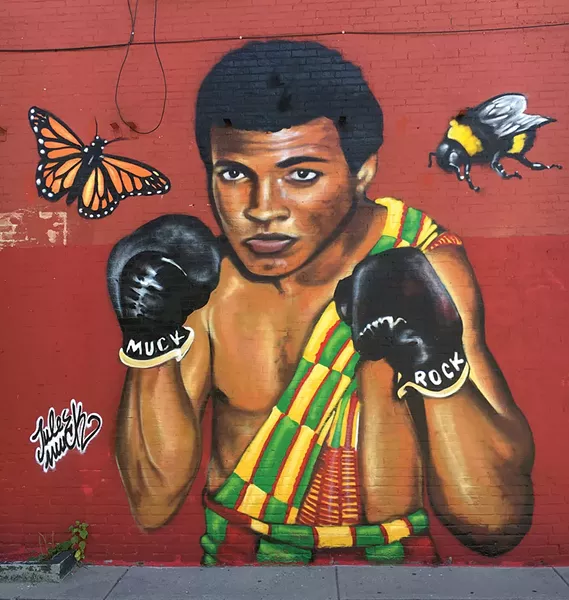 The Muhammad Ali mural at the Mawuhi African Market - MATTHEW ROY