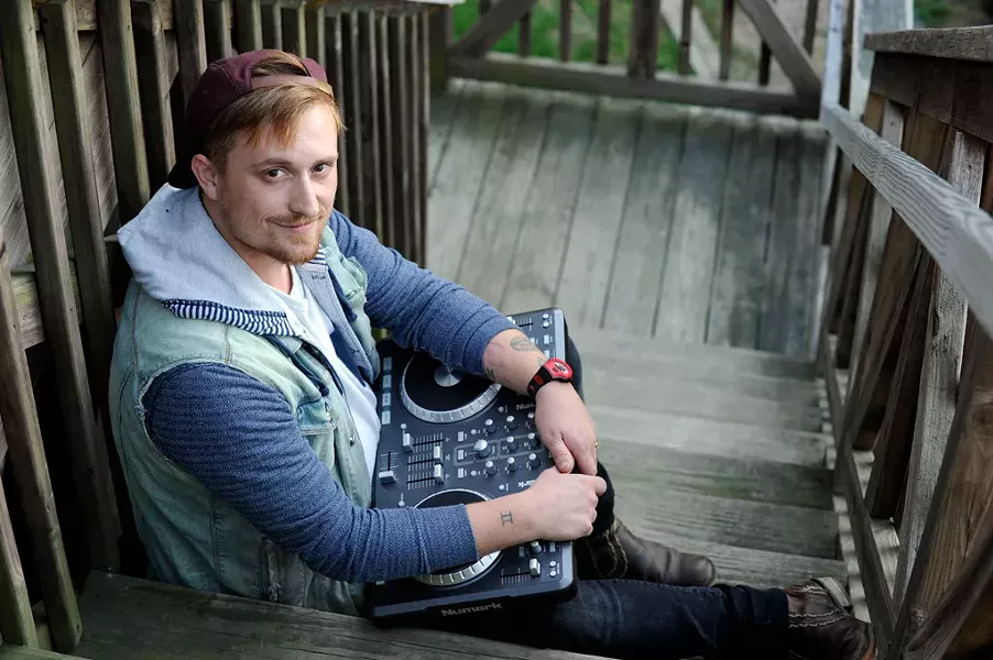 Musician Julian DeFelice, of Orange Julians, with his digital DJ controller at his home in Stowe - JEB WALLACE-BRODEUR