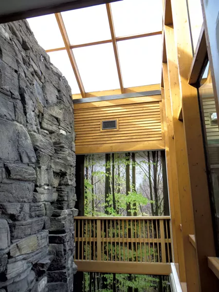 Photo-like wallpaper evoking the outdoors at American Meadows - COURTESY OF AROCORDIS DESIGN