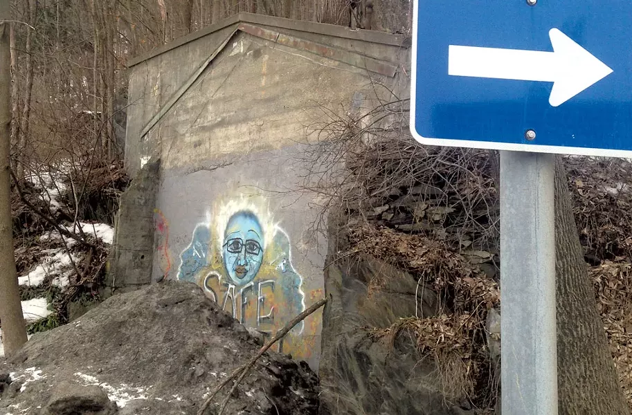 Mystery wall at the intersection of Northfield Street and Memorial Drive in Montpelier - KEN PICARD