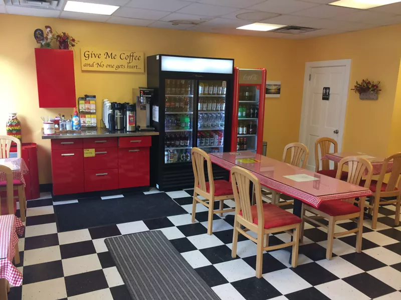 The dining room at the Little Red Kitchen - SUZANNE PODHAIZER