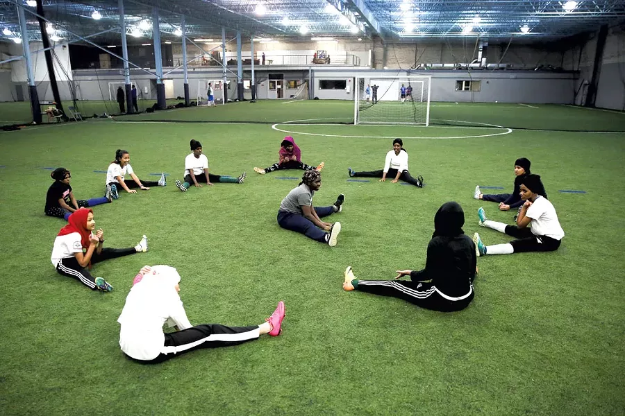 The Golden Blazers Girls Soccer Team practices at Shelburne Field House - JAMES BUCK