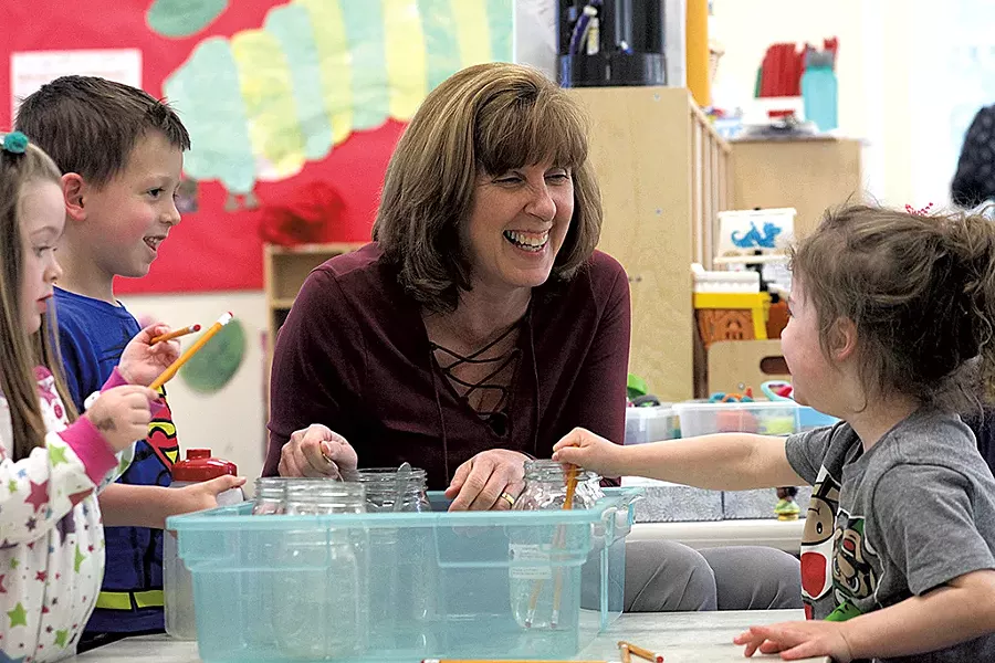 Trisha Scharf with students - MATTHEW THORSEN