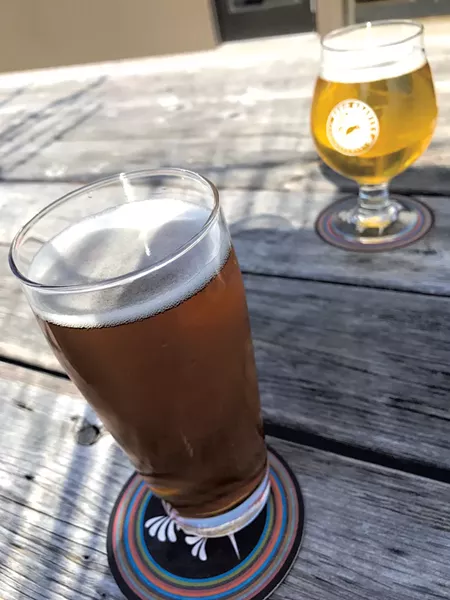 Beer at Zero Gravity - SUZANNE M. PODHAIZER