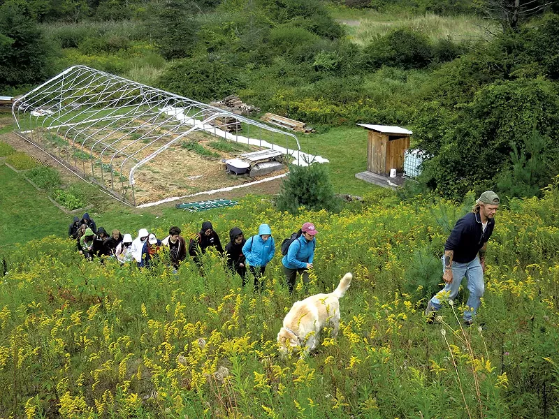Jon Turner leading a group of students on a tour of the farm - MATTHEW THORSEN