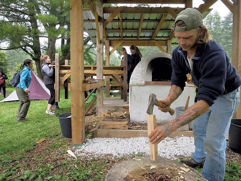 Working on the wood-fired pizza oven - MATTHEW THORSEN