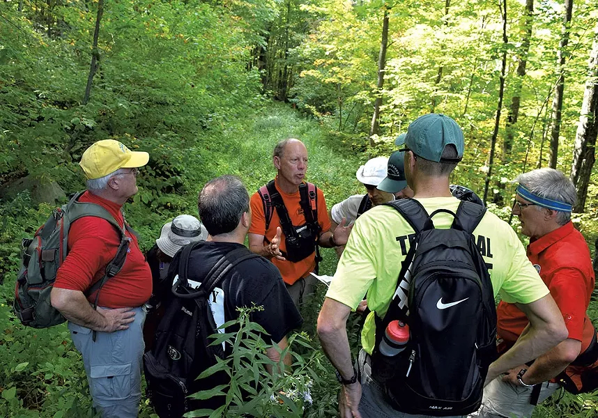Neil Van Dyke talking to rescue squad members - TERRI HALLENBECK