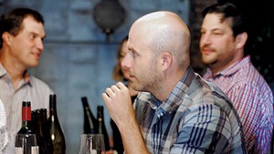 Master sommelier Dustin Wilson giving a wine tasting at Dedalus Wine Shop, Market &amp; Wine Bar