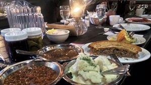 Counterclockwise from top right: omelette, Qu&eacute;b&eacute;cois tourti&egrave;re, country potatoes, wood-fired baked beans, meatballs and accoutrements
