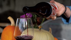 Pouring red Vin de Table at Ellison Estate Vineyard in Stowe