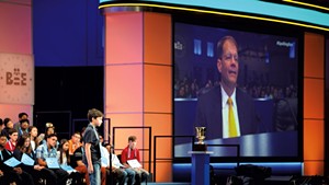 Dr. Jacques Bailly on the big screen at the 2018 Scripps National Spelling Bee