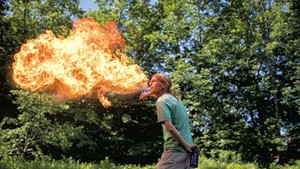 Chris Cleary breathes fire