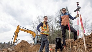 Surveyor Rebecca Gilson (left) and survey technician Camilla Mahon with dog Peso on-site in Stowe