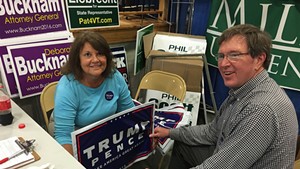 Pam and John Ackerson staff a Chittenden Country Republican Party booth Monday at the Champlain Valley Fair.