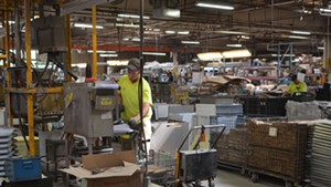 A Blodgett employee works in the assembly line