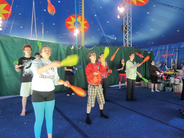 Learning how to juggle at Circus Smirkus