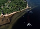 Why Did a Chopper Haul Another Aircraft Across Lake Champlain?