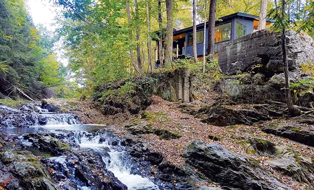 How a Creek-Side Cabin in Waterbury Was Transformed Into an Industrial-Chic Bachelor Pad - Vimarsana News