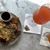 Half order of chicken and waffles at Monarch & the Milkweed, with brunch beverages Half order of chicken and waffles at Monarch & the Milkweed, with brunch beverages