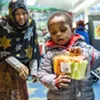 Nuna Ahmed and her grandson Mukhatar Kassim shop earlier this year at the Feeding Chittenden food pantry in Burlington. Nuna Ahmed and her grandson Mukhatar Kassim shop earlier this year at the Feeding Chittenden food pantry in Burlington.