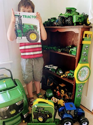 COURTESY OF HENRY SHELDON MUSEUM - A young John Deere collector