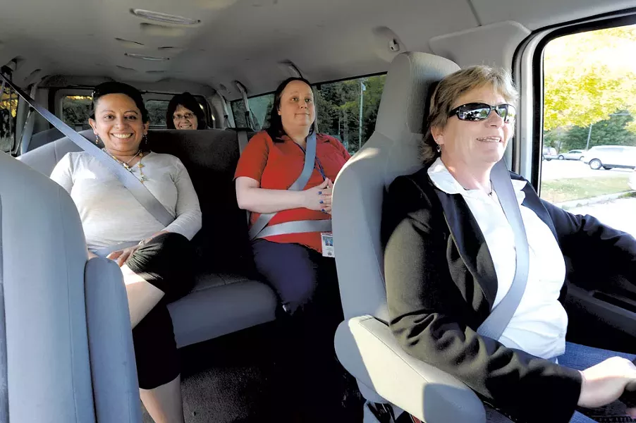Wendy Edwards, right, drives a vanpool with Alma Greene, Jane Lolax and Laura Callahan - JEB WALLACE-BRODEUR