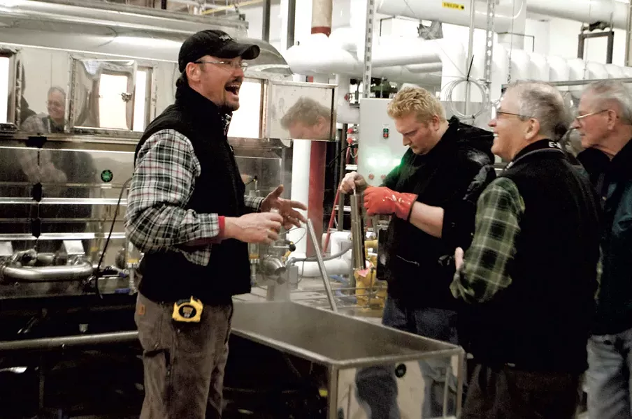Workers monitor and test the syrup at Sweet Tree's Island Pond plant - HANNAH PALMER EGAN