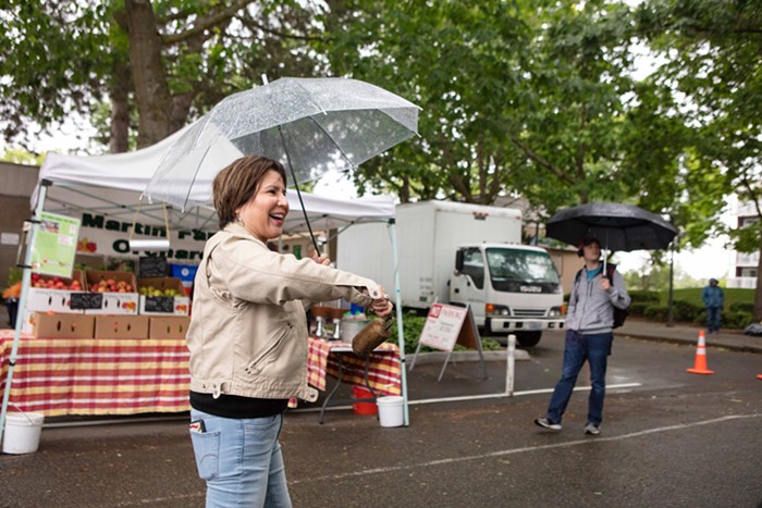 Juarez ringing the opening bell of the Lake City Farmers Market.