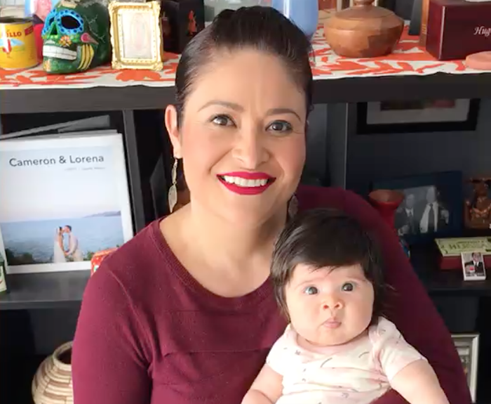 Lorena González is president of the Seattle City Council. In her arms is Nadia Luciana, her three-month-old.