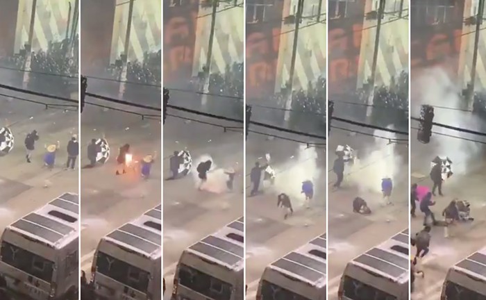 A protester being hit by a flash grenadeâor some other kind of explosiveâthrown by SPD on Sunday, June 7, and then crumpling to the street. A protester being hit by a flash grenadeâor some other kind of explosiveâthrown by SPD on Sunday, June 7, and then crumpling to the street.