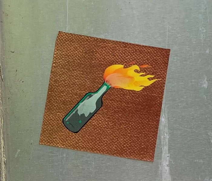 A molotov cocktail mid-flight. A molotov cocktail mid-flight.
