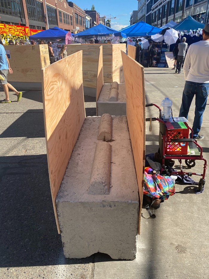 The insides of the new cement and plywood barricade.