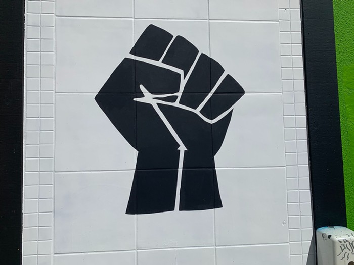 Close up of the fist above the water fountain.