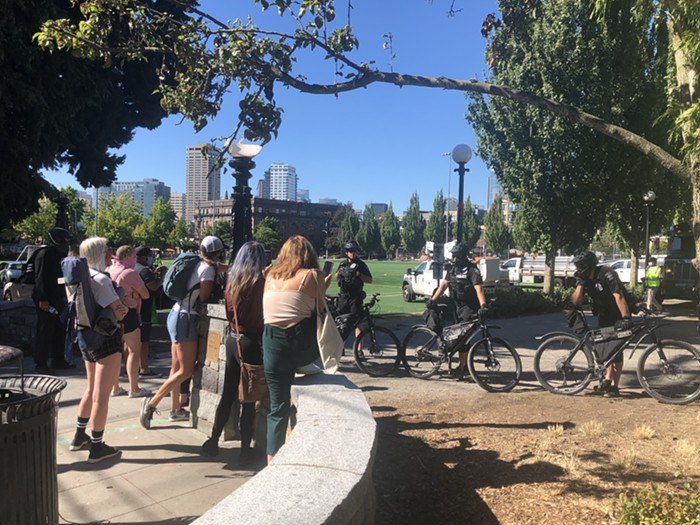 A group of protesters promised cops theyd return.