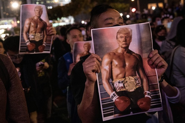 Hong Kong protesters holding up pictures of swole Trump during last years pro-Democracy demonstrations. Hong Kong protesters holding up pictures of swole Trump during last years pro-Democracy demonstrations.